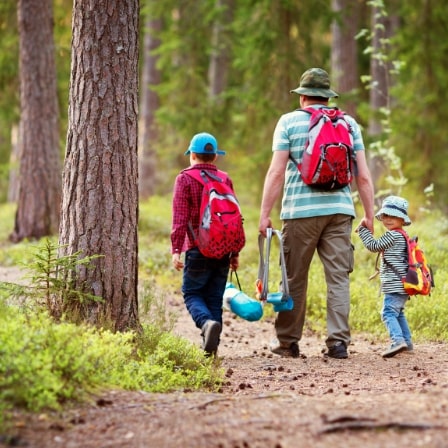 Father and kids hiking